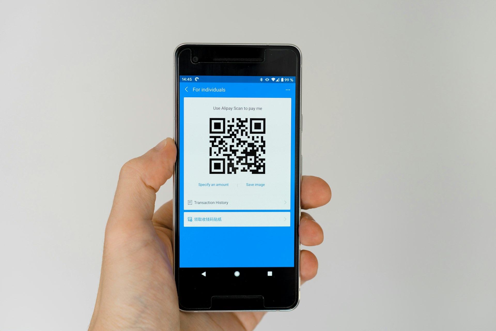 black android smartphone displaying qr code